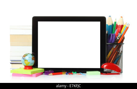 Tablet PC with school office supplies on white background Stock Photo