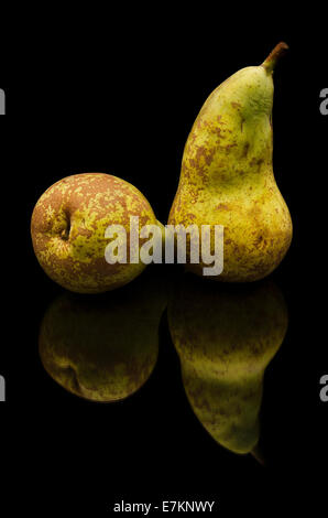 Brown pears on black isolated background Stock Photo