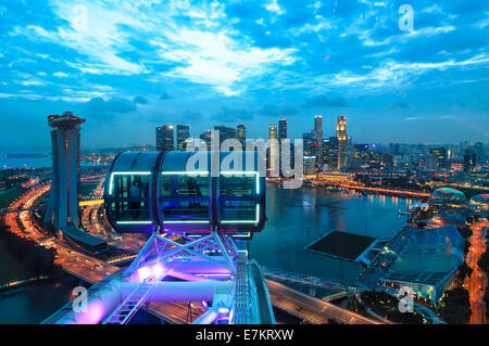 Looking out over Singapore at sunset from the Singapore Flyer. Stock Photo