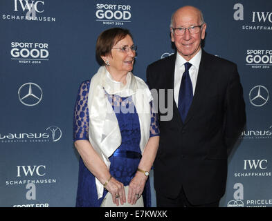Former English soccer player Sir Bobby Charlton and his wife Norma arrive for the charity gala during the 'Laureus for Good' weekend at Bayerischer Hof in Munich, Germany, 19 September 2014. The donated money is given to the sport projects of the Laureus Sport for Good Germany Foundation. Photo: Ursula Dueren/dpa Stock Photo