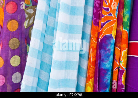 Set of multi-colored cloths hanging, as a background image Stock Photo
