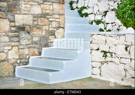 Blue steps in a courtyard on Greece Stock Photo