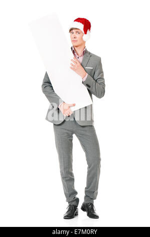 Young man in Santa hat Stock Photo