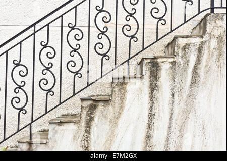 Stone steps and iron railings Stock Photo