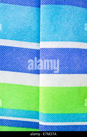 Blue,green and white striped fabric as a background Stock Photo