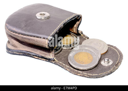 Coins from the old wallet on a white background. Vintage empty purse ...