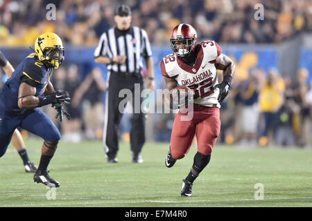 Morgantown, West Virginia, USA. 20th Sep, 2014. Oklahoma Sooners running back ALEX ROSS (28) runs with the ball in the Big 12 conference football game being played at Mountaineer Field in Morgantown, WV. Credit:  Ken Inness/ZUMA Wire/Alamy Live News Stock Photo