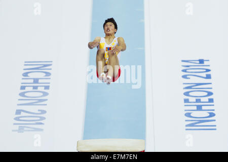 Incheon, South Korea. 21st Sep, 2014. Munkhtsog Ariunbulag of Mongolia competes during the vault of men's gymnastics artistic event at the 17th Asian Games in Incheon, South Korea, Sept. 21, 2014. Credit:  Zheng Huansong/Xinhua/Alamy Live News Stock Photo