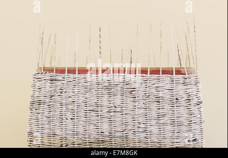 Weave in newspapers Stock Photo