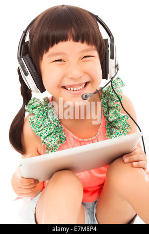 closeup of happys little student girl holding a tablet.isolated on white background Stock Photo