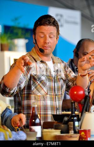 Jamie Oliver cooking demo in The Big Kitchen at the big feastival held at Alex James? farm near Kingham, Oxfordshire 01/09/20122 Stock Photo