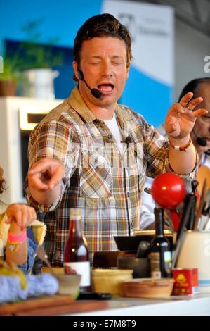 Jamie Oliver cooking demo in The Big Kitchen at the big feastival held at Alex James? farm near Kingham, Oxfordshire 01/09/2012 Stock Photo