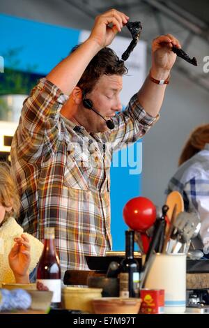 Jamie Oliver cooking demo in The Big Kitchen at the big feastival held at Alex James? farm near Kingham, Oxfordshire 01/09/20122 Stock Photo