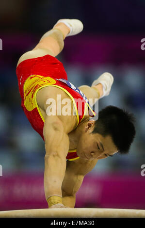 Incheon, South Korea. 21st Sep, 2014. Huang Yuguo of China competes during the vault of men's gymnastics artistic event at the 17th Asian Games in Incheon, South Korea, Sept. 21, 2014. Credit:  Zheng Huansong/Xinhua/Alamy Live News Stock Photo