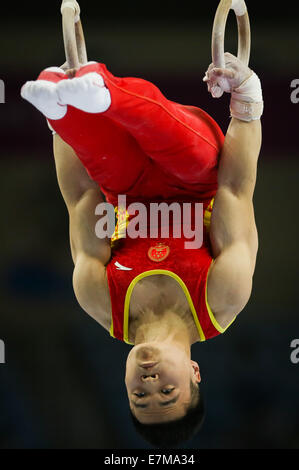 Incheon, South Korea. 21st Sep, 2014. Liao Junlin of China competes during the rings of men's gymnastics artistic event at the 17th Asian Games in Incheon, South Korea, Sept. 21, 2014. Credit:  Zheng Huansong/Xinhua/Alamy Live News Stock Photo