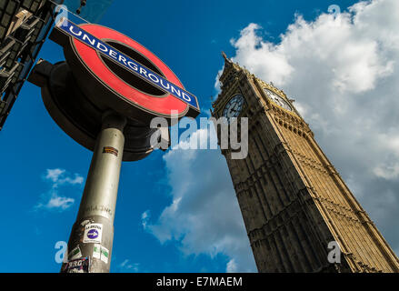London Transport Logo and Big Ben, dramatic angle Stock Photo