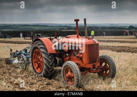 A vintage CASE tractor being used in a ploughing competition on The Lizard in Cornwall. Stock Photo