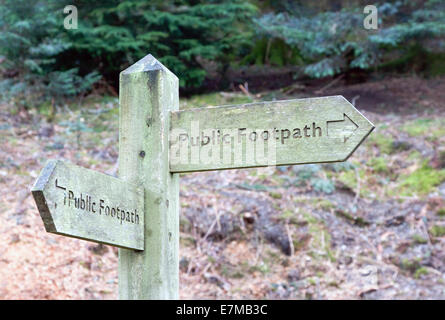 Public footpath finger post showing two different directions Public footpath finger post showing two different directions