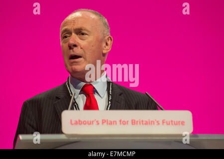 Manchester, UK. 21st September, 2014. Sir Richard Leese, leader of Manchester City Council, addresses the auditorium on day one of the Labour Party's Annual Conference taking place at Manchester Central Convention Complex Credit:  Russell Hart/Alamy Live News. Stock Photo