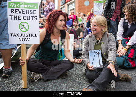 Manchester, UK. 21st Sep, 2014. Green Party leader, Natalie Bennett (right) joins the march as around 1500 demonstrators in Manchester, joined similar demonstrations around the world, as part of a global day of action as an emergency summit of world leaders is set to take place in New York. Many demonstrators where against the controversial method of hydraulic fracturing, also known as 'fracking'. Credit:  Christopher Middleton/Alamy Live News Stock Photo