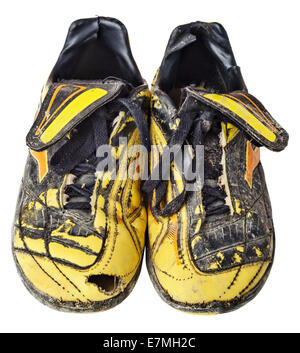 Pair of old football shoes. Soccer boots. Isolated on white background. File contains a clipping path. Stock Photo