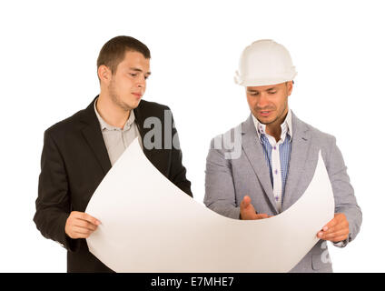 Young Client and Engineer Looking at Building Blueprint while Discussing. Captured on White Background. Stock Photo