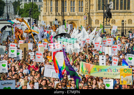 London, UK. 21st Sept 2014. People's Climate march, London – As part of an international day of protest - led by Emma Thompson and Vivienne Westwood - people march to demand: “a world with an economy that works for people and the planet; a world safe from the ravages of climate change; and a world with good jobs, clean air, and healthy communities for everyone.  The march started in Temple Place and ended outside Parliament – Westminster, London, UK,  21st Sept  2014. Guy Bell / Alamy Live News Stock Photo