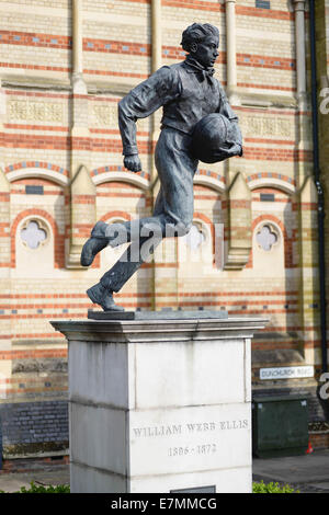 William Webb Ellis statue, outside Rugby School, Rugby, Warwickshire. The former schoolboy was the founder of the sport of rugby Stock Photo