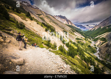 Hiking on the Base of the Towers classic trail in Patagonia, Chile. Stock Photo