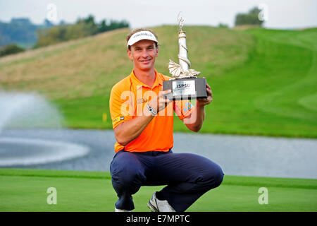 Newport, Wales. 21st Sep, 2014. ISPS Handa Wales Open Golf. Day 4. Joost Luiten claims his prize with trophy Credit:  Action Plus Sports/Alamy Live News Stock Photo