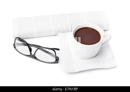 Cup of coffee with a rolled up newspaper and glasses, isolated on white background. My morning routine. Stock Photo
