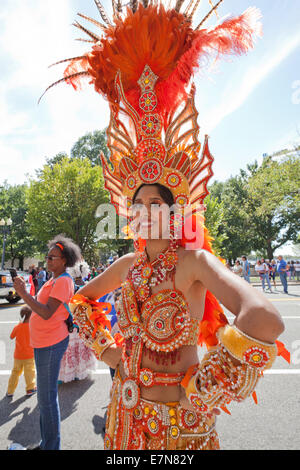 Woman in brazilian samba carnival costume with colorful feathers ...