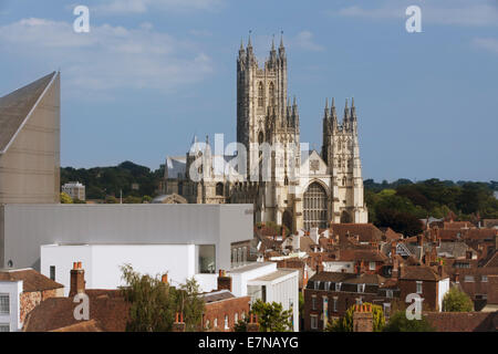 View across roofs of Canterbury city showing historic Canterbury Cathedral as the with the modern Marlowe Theatre in foreground Stock Photo