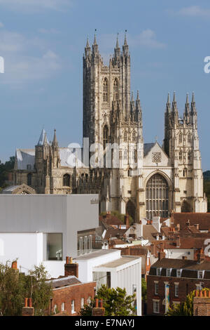 View across roofs of Canterbury city showing historic Canterbury Cathedral as the with the modern Marlowe Theatre in foreground Stock Photo