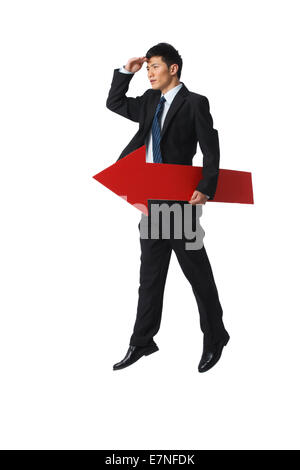 Business man looking at red arrow drawn by a hand Stock Photo - Alamy