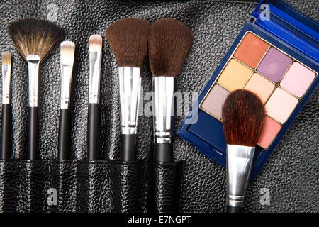 Powder foundation and makeup brush Stock Photo
