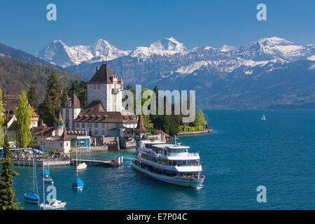 Castle, ship, Oberhofen, Lake Thun, spring, canton Bern, Bernese Alps, Bernese Oberland, Jungfrau, monk, Mönch, Eiger, ship, boa Stock Photo