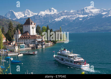 Castle, ship, Oberhofen, Lake Thun, spring, canton Bern, Bernese Alps, Bernese Oberland, Jungfrau, monk, Mönch, Eiger, ship, boa Stock Photo