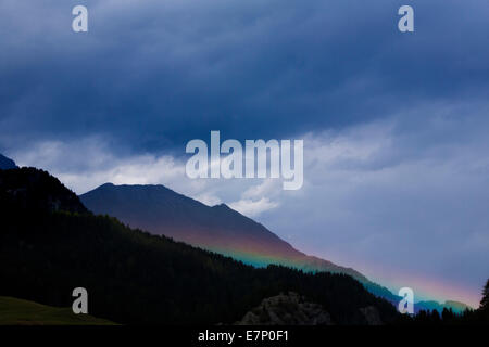 Rainbows, Oberhalbstein, clouds, cloud, mountain, mountains, autumn, weather, canton, GR, Graubünden, Grisons, Switzerland, Euro Stock Photo