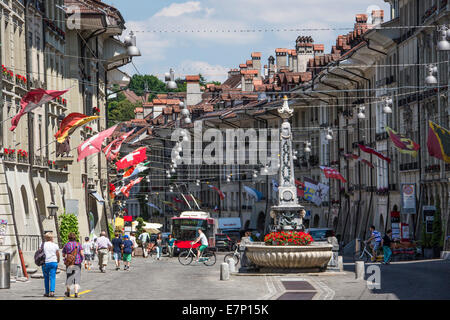 Bern, Berne, Kramgasse, Switzerland, Europe, architecture, cables, city, downtown, famous, flags, old town, roofs, skyline, stre Stock Photo