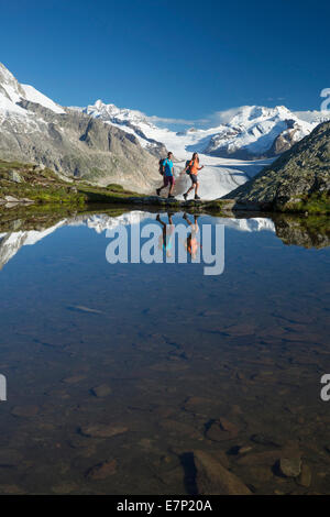 Eggishorn, hiker, Tällisee, Aletsch glacier, mountain, mountains, glacier, ice, moraine, summer sport, spare time, adventure, ca Stock Photo