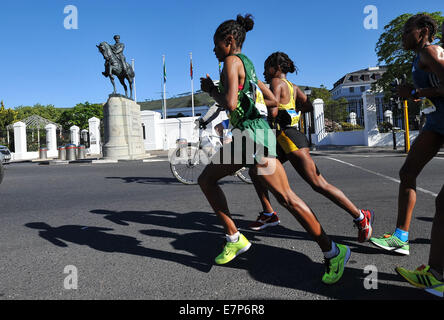 Cape Town, South Africa. 21st Sep, 2014. Meseret Biru of Ethiopia runs past the Houses of Parliament and the statue of Lovis Botha, first Prime Minister of the Union of South Africa, during the 2014 Sanlam Cape Town Marathon on September 21, 2014 in .  Credit:  Roger Sedres/Gallo Images/Alamy Live News Stock Photo