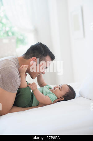 Father playing with his son (6-11 months) Stock Photo