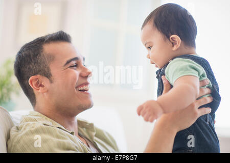 Father playing with his son (6-11 months) Stock Photo