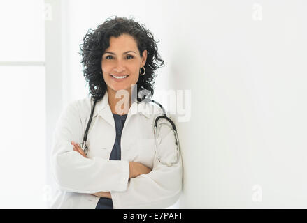 Portrait of smiling female doctor Stock Photo