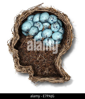 Protecting the brain mental health concept as a bird nest shaped as a human head and face with a group of eggs in the shape of the thinking organ as a medical metaphor for the fragility of neurology and intelligence.