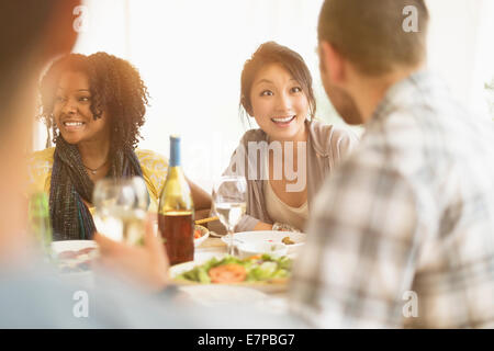 Group of friends enjoying dinner party Stock Photo