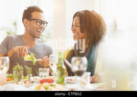 Two friends enjoying dinner party Stock Photo