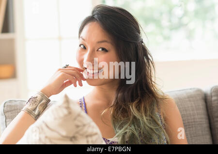 Portrait of young woman smiling Stock Photo