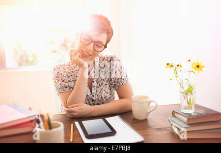 Young woman working in home office Stock Photo